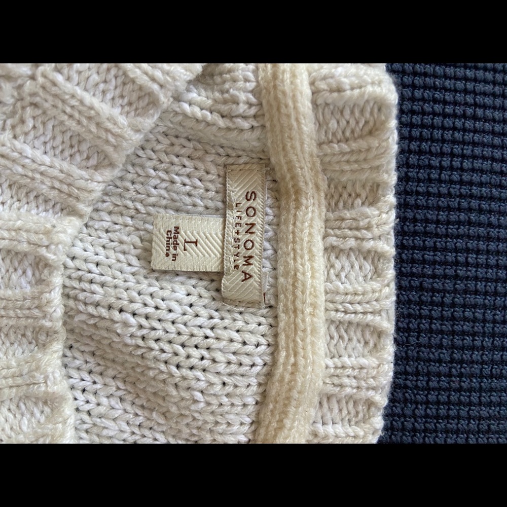 Cream Sweater lightly used. Great for winter months!